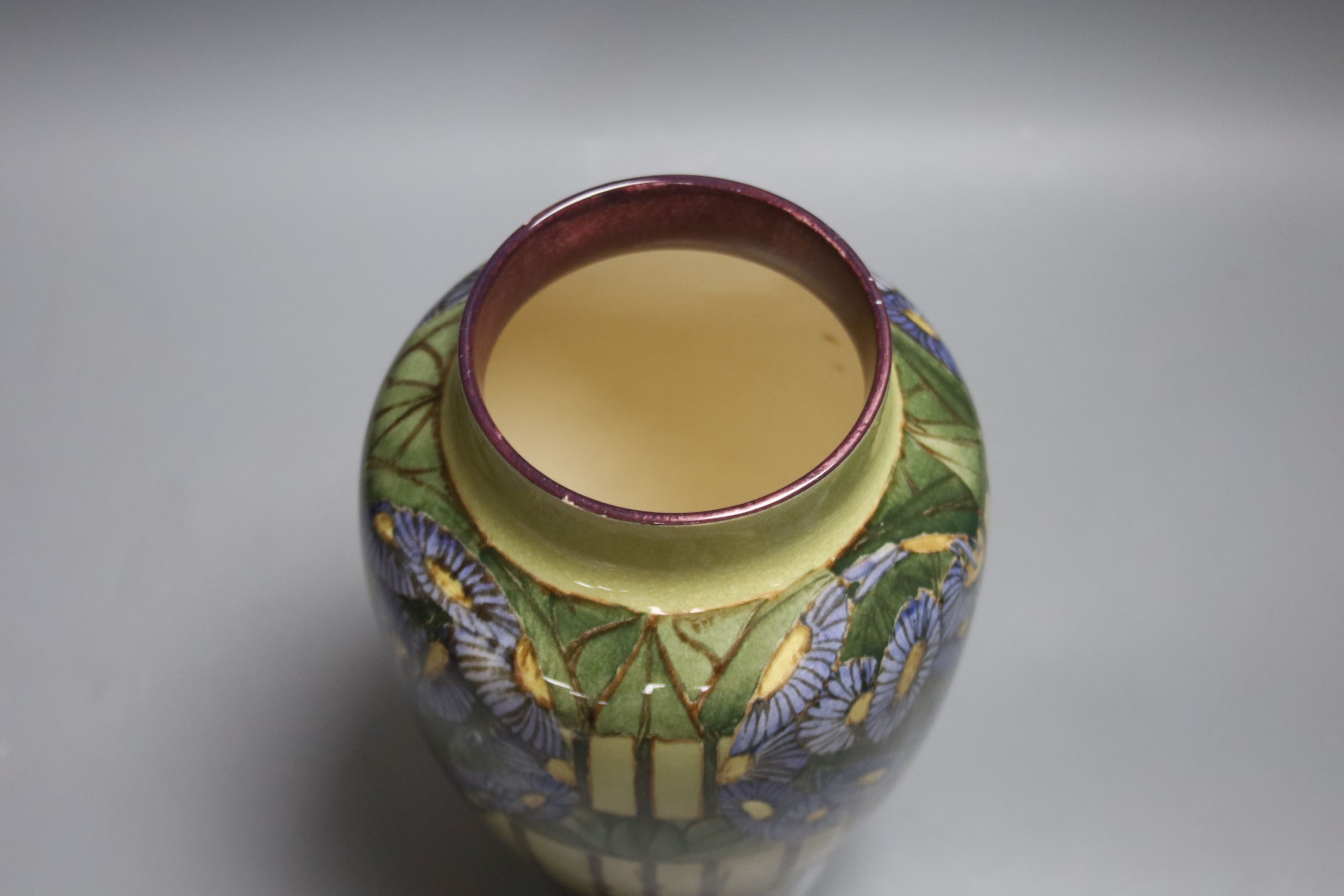 Margaret Armstrong, a floral Doulton Lambeth vase, 25cm